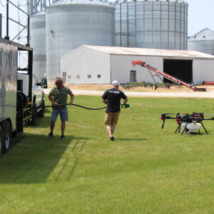agricultural drone being fueled up