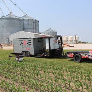 agricultural drone sitting by drone trailer