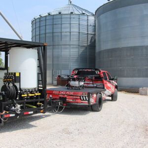 agricultural drone trailer being pulled on farm road